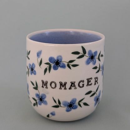 Mor kop, Momager blå blomster