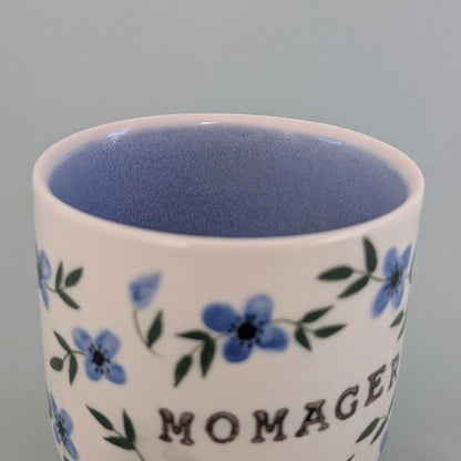 Mor kop, Momager blå blomster