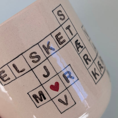 Mor kop, Scrabble med hjerte