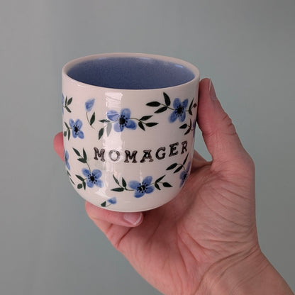 Mor kop, Momager blå blomster